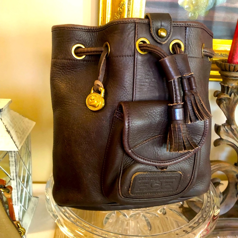 Dooney & Bourke Brown bucket style bag.